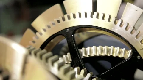 Close-Up Tilt Over Brass Clockwork Gears 스톡 동영상 345751761