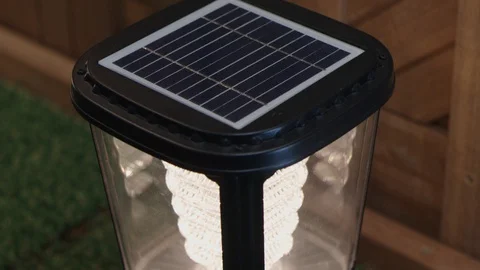 Close-up Tilt Shot Of A Solar Panel Light Outdoors Stock Footage 129398629