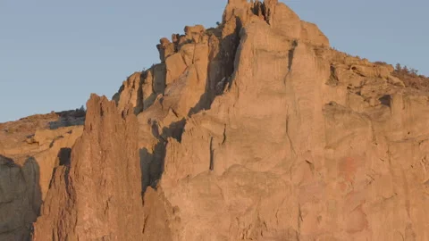 Close Tilt Up on Smith Rock Oregon in Early Morning Light - Shallow DOF Stock Footage 145965149