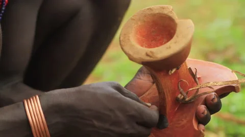 Close Up Tilting Up To A Tribal Man Using Traditional Carving Methods Stock Footage 66519095