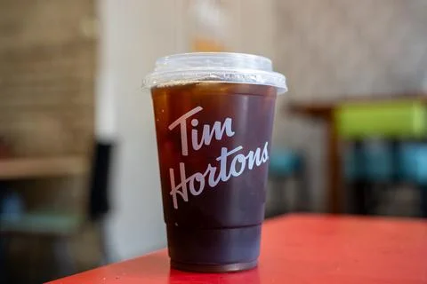 Close up of Tim Hortons iced coffee cup. Toronto, Canada - June 12, 2026. Stock Photos