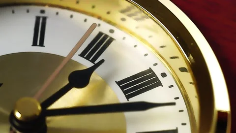 Close-up time of a clock with Roman numerals on the watch face.Gold watch.Time c Stock Footage 171763824
