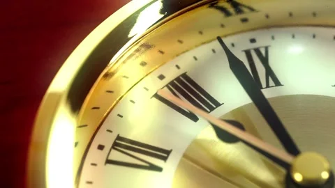 Close-up time of a clock with Roman numerals on the watch face.Gold watch.Time c 스톡 동영상 171763843