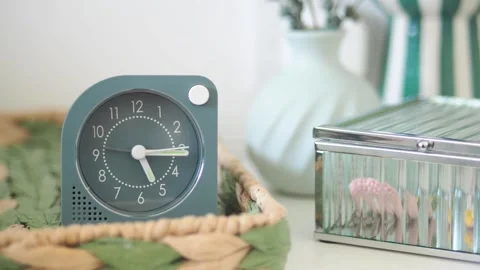 Close-up time lapse of an alarm clock's minute and second hands moving quickl Stock Footage 332041246