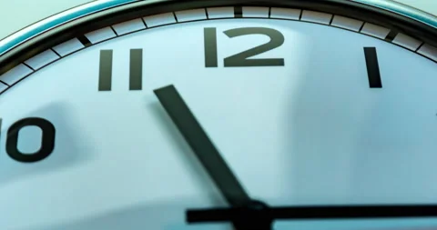 Close-up time lapse on a analog modern wall clock Stock Footage 143254216