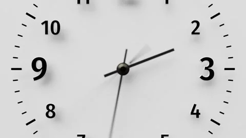 Close-up time-lapse minimalist black wall clock, neutral white background Stock Footage 313635161