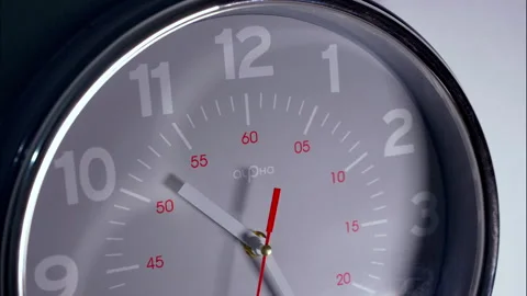 Close-Up Time-Lapse of a Modern Wall Clock in an Office Stock Footage 337392753