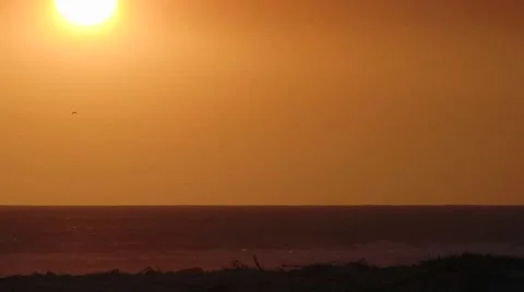 Close-up time lapse of sun setting over the Pacific Ocean in Ventura Stock Footage 1021318