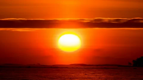 Close-up time-lapse of the sunrise over the ice-covered sea Stock Footage 148941702