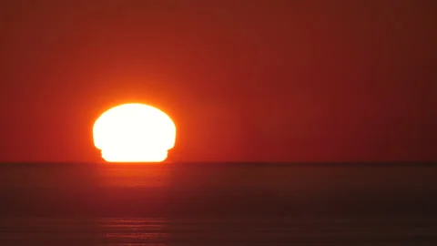 Close-up Time Lapse Sunset Red Sky and Beautiful Sea Footage Sun of Sunshine 4K Stock Footage 147906714
