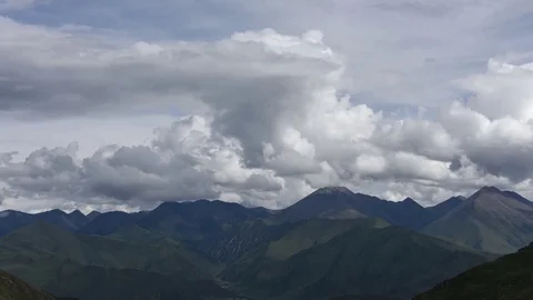 Close up time lapse tibet mountain peaks and clouds forming in Tibet Stock Footage 72510789