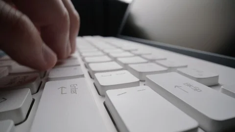 Close-up time lapse typing on keyboard with fingers. Macro soft focus dolly shot Stock Footage 114609212