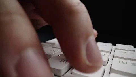 Close-up time lapse typing on keyboard with fingers. Macro soft focus dolly shot Stock Footage 115005062