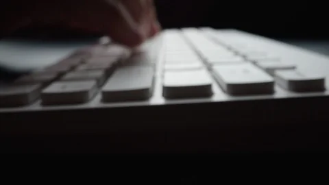 Close-up time lapse typing on keyboard with fingers. Macro soft focus dolly shot Stock Footage 115005065