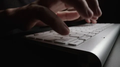 Close-up time lapse typing on keyboard with fingers. Macro soft focus dolly shot Stock Footage 115479114