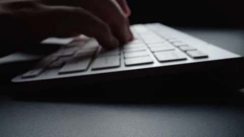 Close-up time lapse typing on keyboard with fingers. Macro soft focus dolly shot Stock Footage 115479153