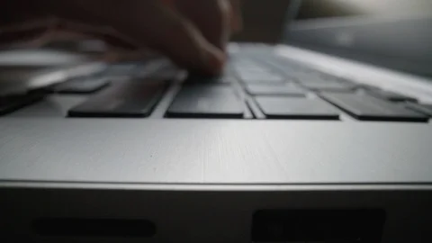 Close-up time lapse typing on keyboard with fingers. Macro soft focus dolly shot Stock Footage 115479191