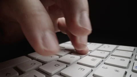 Close-up time lapse typing on keyboard with fingers. Macro soft focus dolly shot Stock Footage 116436726