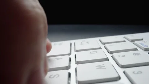 Close-up time lapse typing on keyboard with fingers. Macro soft focus dolly shot Stock Footage 117813680