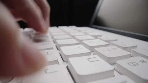 Close-up time lapse typing on keyboard with fingers. Macro soft focus dolly shot Stock Footage 118281685