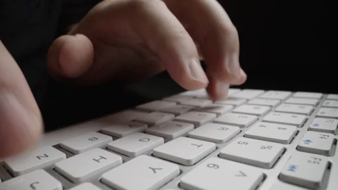 Close-up time lapse typing on keyboard with fingers. Macro soft focus dolly shot Stock Footage 118281686