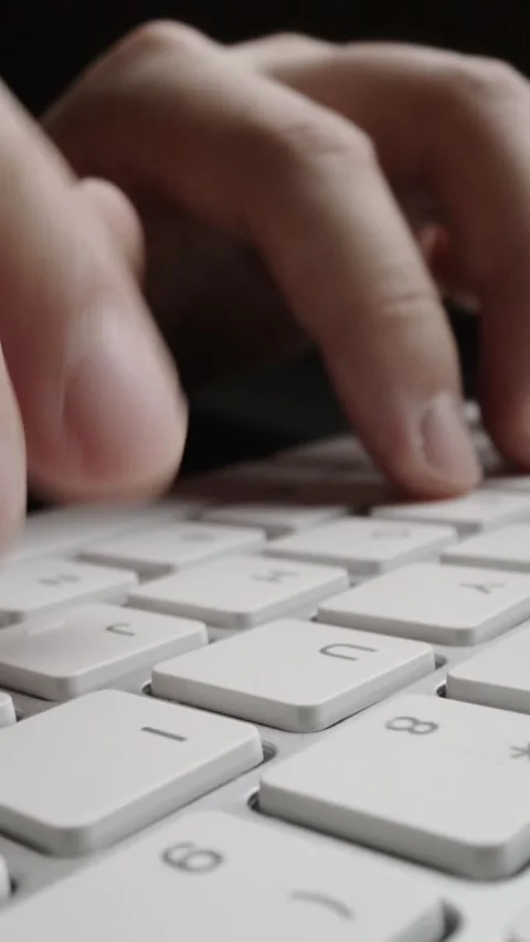 Close-up time lapse typing on keyboard with fingers. Macro soft focus dolly shot Stock Footage 289307474