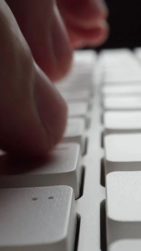 Close-up time lapse typing on keyboard with fingers. Macro soft focus dolly shot Stock Footage 292738566