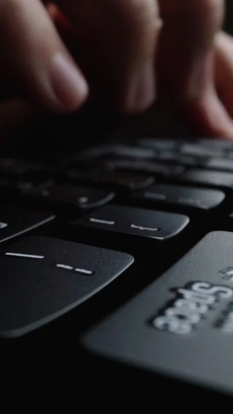Close-up time lapse typing on keyboard with fingers. Macro soft focus dolly shot Stock Footage 294204885
