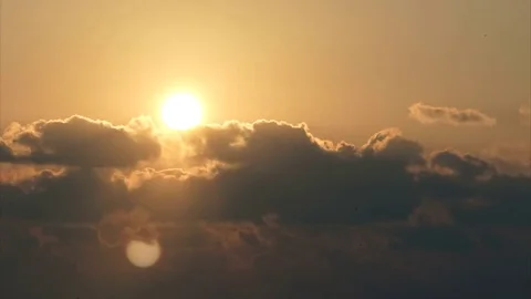 Close up time lapse video of sun is setting behind the clouds Stock Footage 82192625