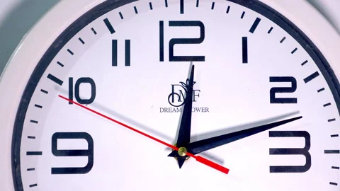 Close-Up Time-Lapse of a White Clock With a Red Second Hand Stock Footage 337397688