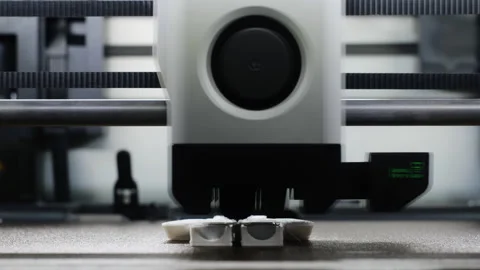 Close Up Timelapse of 3D Printer Head Printing Toy Fast Stock Footage 332106729