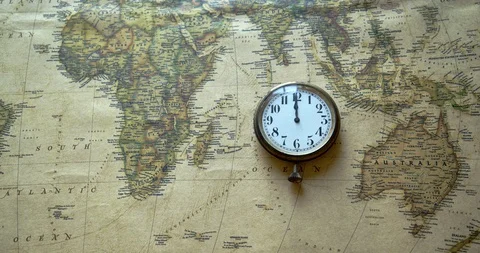 Close-Up timelapse of vintage clock and antique map (A) Stock Footage 100978120