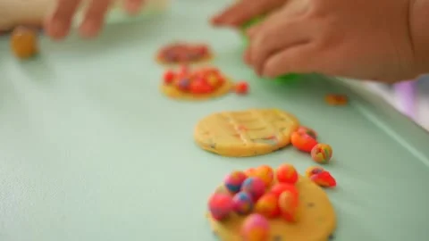 Close-up of Tiny Asian chinese hands making clay objects Stock Footage 140967697