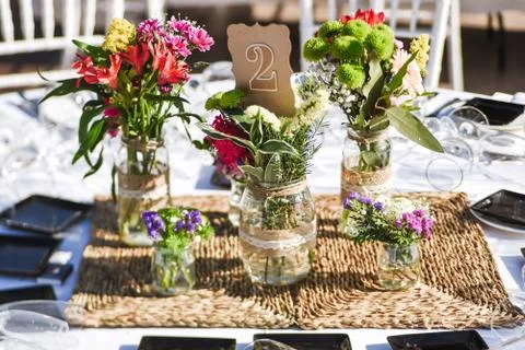 Close-up of tiny bouquets on a restaurant table Stock Photos