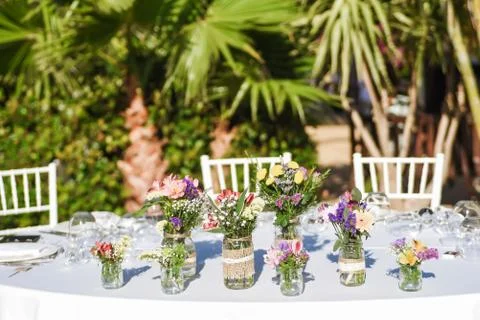 Close-up of tiny bouquets on a restaurant table Stock Photos