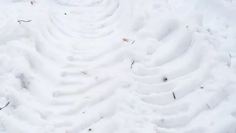 Close-up of tire prints in snow Stock Footage 341317071