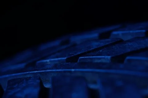 Close up tire texture pattern with blue light, cold tone color Foto stock