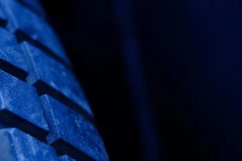 Close up tire texture pattern with blue light Foto stock