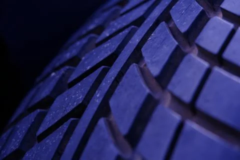 Close up tire texture pattern with purple light Stock Photos