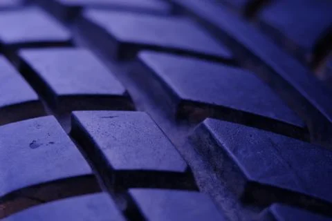 Close up tire texture pattern with purple light Foto stock