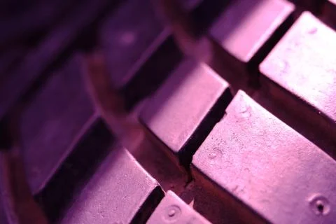 Close up tire texture pattern with violet light Stock Photos