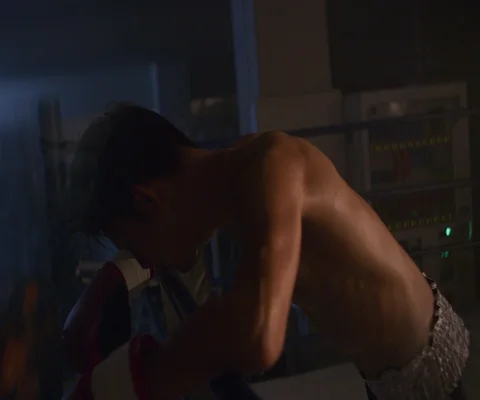 Close up of tired man in boxing ring leaning on ropes with spotlights, Japan Stock Footage 147054629