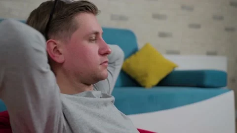 Close up of a tired man suffering from headache, massaging temples, exhausted. Stock Footage 148237084