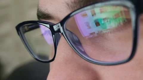 Close up of tired man working at night on laptop, man in eye glasses with Video stock 224106566