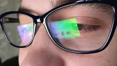 Close up of tired man working at night on laptop, man in eye glasses with Stock Footage 224705106