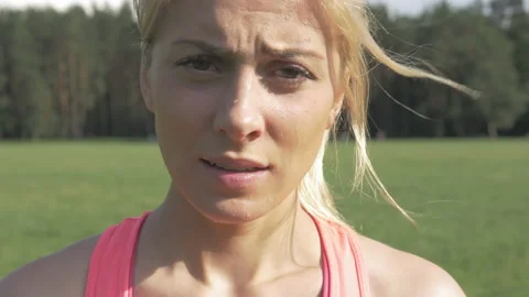 Close-up of tired runner after hard workout outdoors. Stock Footage 132734129