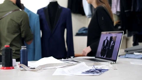 Close-up a tissue samples, sketches, a laptop, coils of threads, a centimeter. Stock Footage