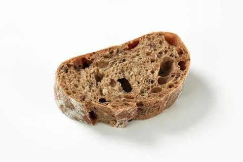 Close-up of toasted bread slice with holes Stock Photos