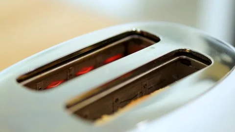 Close-Up of Toaster Heating Elements Glowing Red Stockbeeldmateriaal 314031322