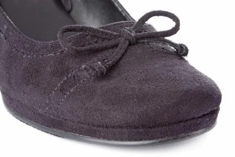 Close up of the toe cap of a black shoe Stock Photos